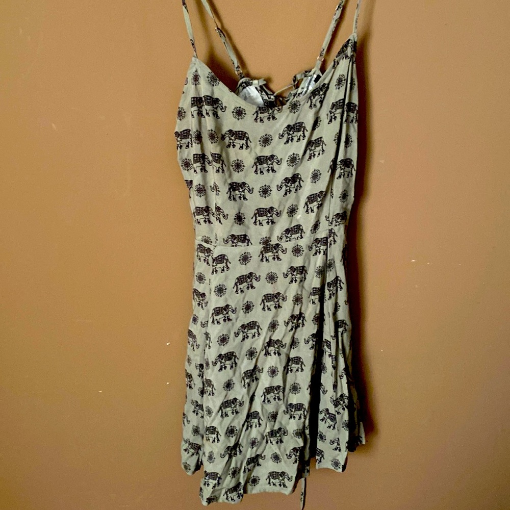 Green dress with black elephant print